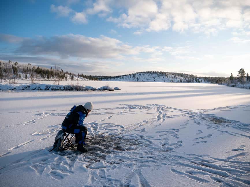 Arctic Fishing & Open Fire Cooking - Drilling through the ice at Rahajärvi