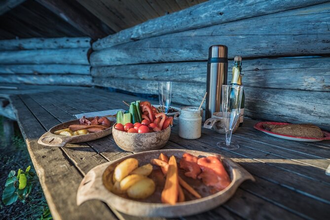 Arctic Midnight Sun Picnic from Rovaniemi - Dinner by the open fire