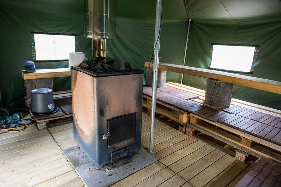 Arctic Tent Sauna Experience with Ice Swimming - Inside the custom tent sauna
