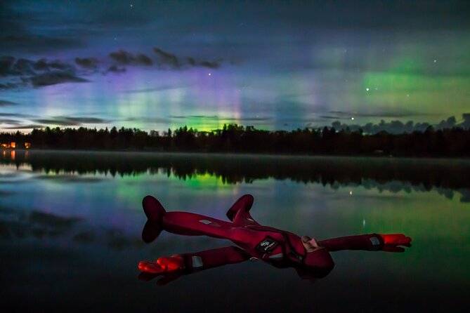 Aurora Ice Floating in Rovaniemi - The fire, tipi, and hot drink after the float