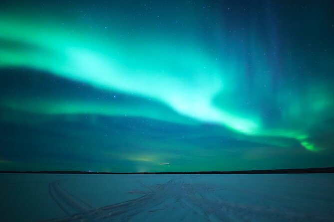 Chasing Aurora with Photographer - Small Group - A Lappish sausage beside an open fire