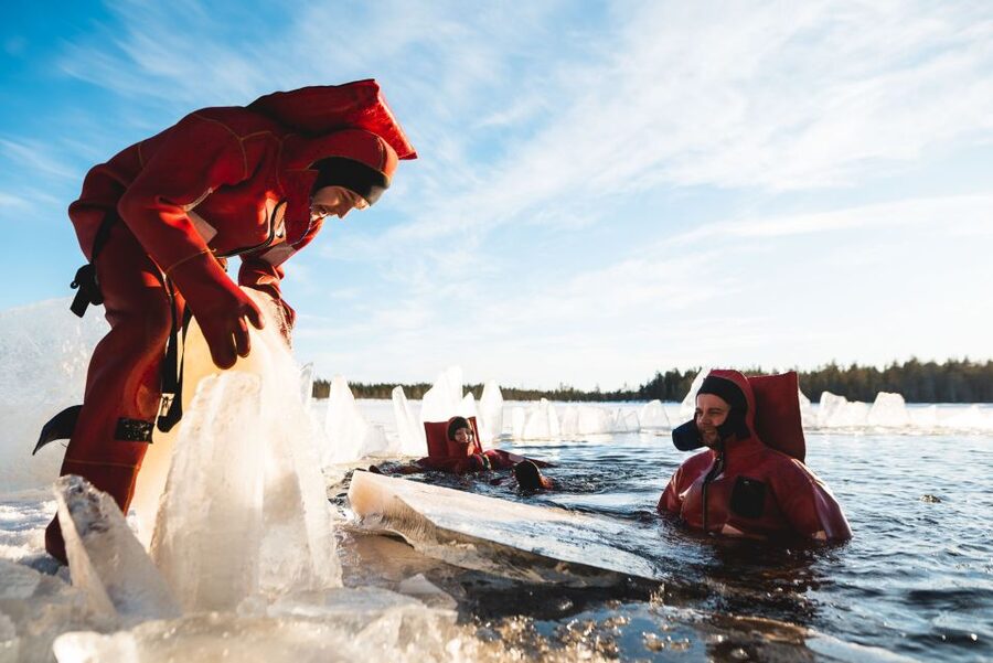 Daytime Ice Floating Rovaniemi, Frozen Lake Experience - Getting ready in the rescue suit