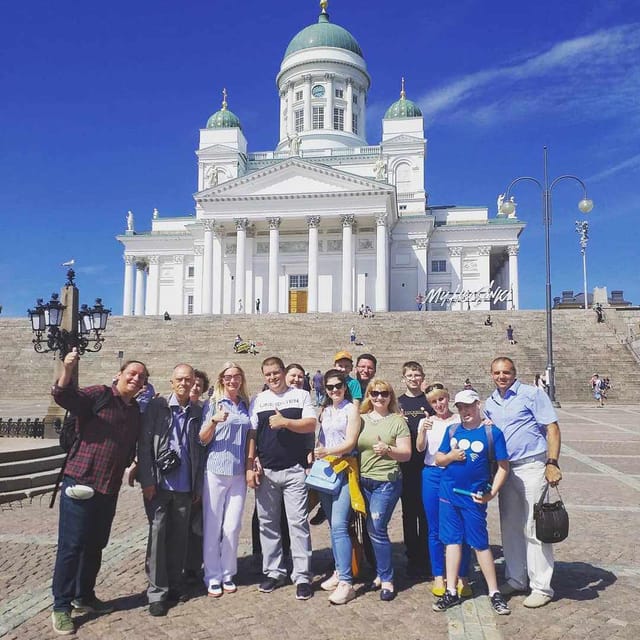 Discover the heart of Finland with a local guide. - Central Station and the National Theatre
