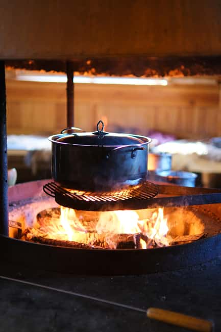 Finnish Traditional Soup Workshop by the Forest (private) - Preparing salmon soup over an open fire