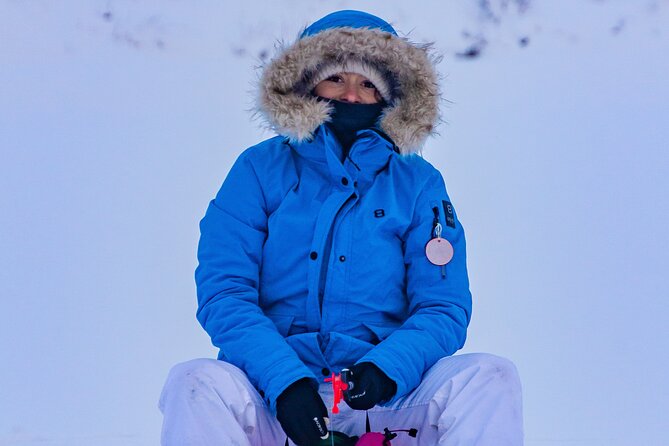 First Ice Fishing Experience in Rovaniemi - Finnish snacks beside an open fire