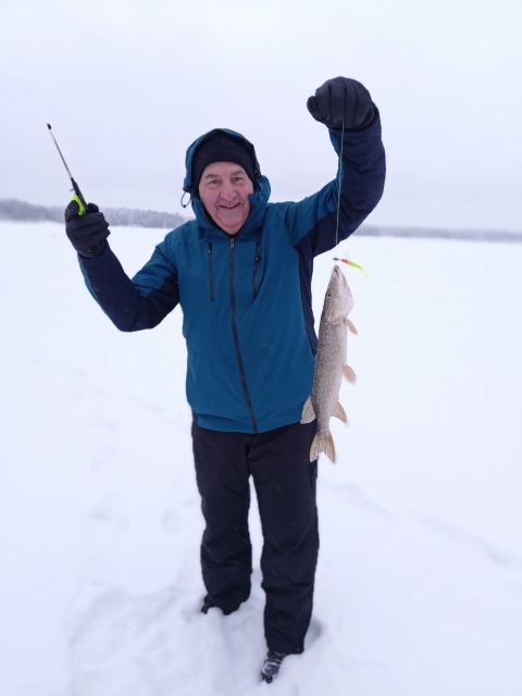 From Helsinki: Bodom Lake Ice Fishing with Food & Drinks - Learning to drill the ice and use the pilkki