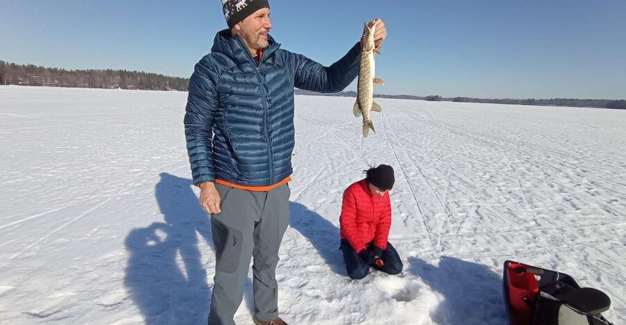 From Helsinki: Bodom Lake Ice Fishing with Food & Drinks - What happens around the laavu fire