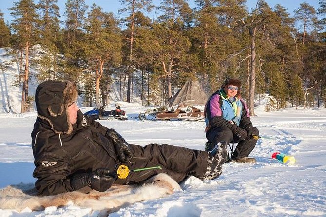 From Kakslauttanen: Ice Fishing Safari to Lake Inari, inc. lunch - Thermal gear and the Ivalo equipment stop