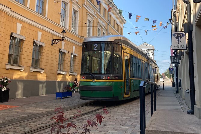 Helsinki Walking Tour - Small Group - The Bank of Finland and a statue with bullet holes