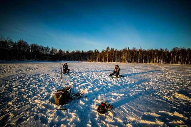 Ice Fishing by Snowmobile from Rovaniemi - Learning the basics of Lapland ice fishing