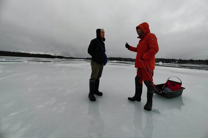 Ice fishing experience with Backpacker Helsinki Tour - Getting onto the frozen lake