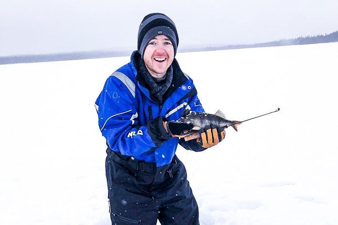 Ice Fishing Trip in Rovaniemi - Learning how to attract fish beneath the ice