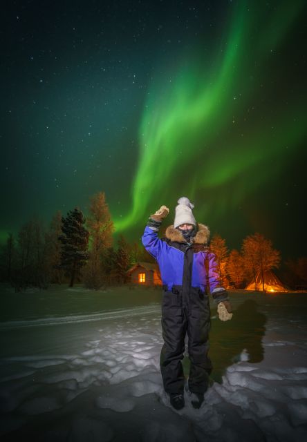 Ivalo: Lake Inari Northern Lights Tour w/ Reindeer & Dinner - A covered sleigh across frozen Lake Inari