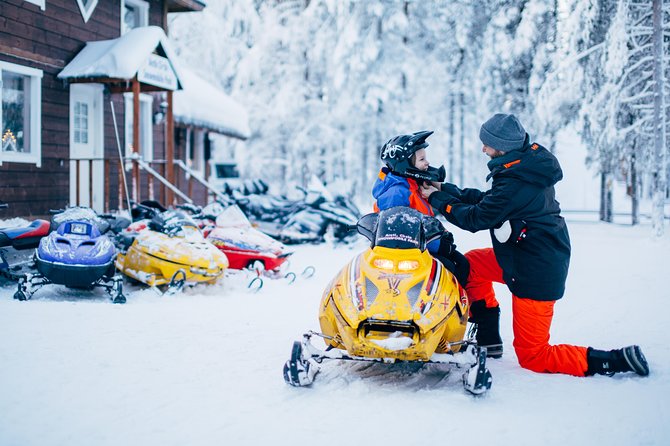 Lapland Family Snowmobile Safari from Rovaniemi - Two adults, one snowmobile, and the seating question