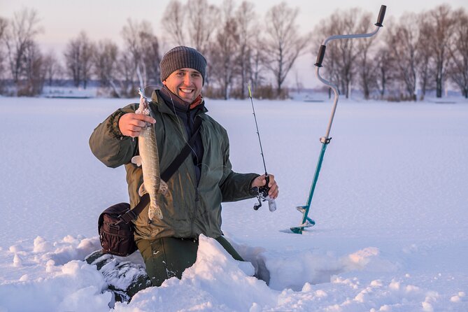Lapland Ice Fishing Experience from Rovaniemi - A Campfire Cookout in the Snow