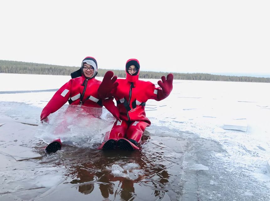 Lapland: Ice Fishing, Floating & BBQ Snow Adventure - The salmon BBQ inside a snowy day