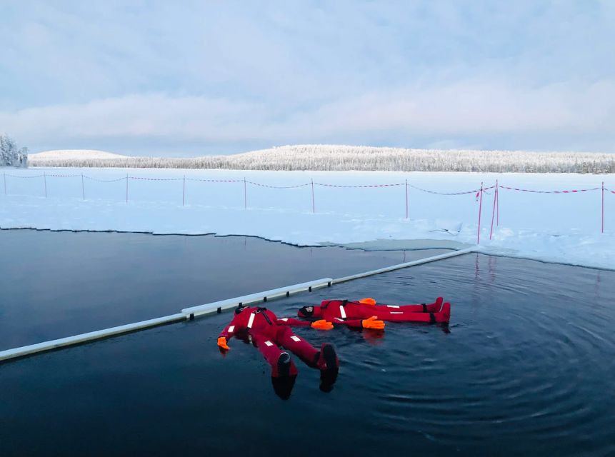 Lapland: Ice Fishing, Floating & BBQ Snow Adventure - Learning to fish through the ice