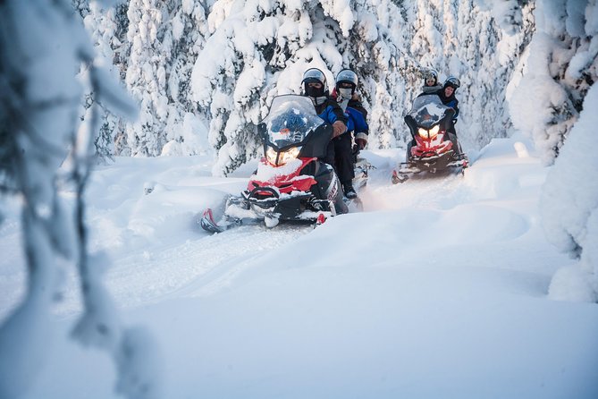 Lappish Lunch Break -Snowmobiling, ice fishing and tasty food - What the $233.94 price really covers