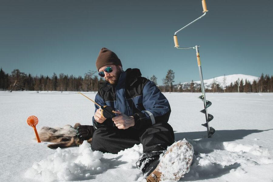 Levi: Finnish Ice Fishing Tour by Car - From central Levi to a frozen lake