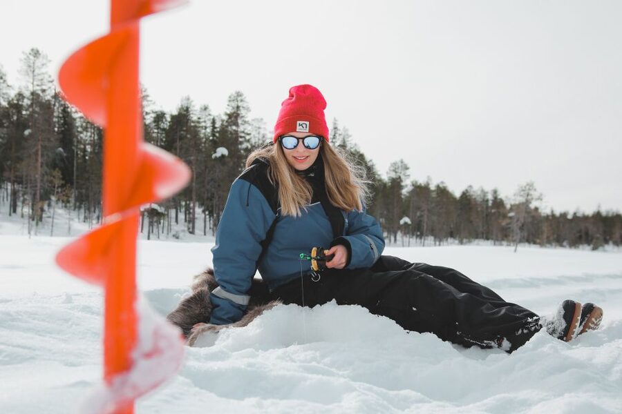 Levi: Finnish Ice Fishing Tour by Car - Drilling through the ice yourself