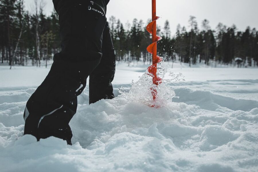 Levi: Finnish Ice Fishing Tour by Car - Getting dressed in Lapland winter gear