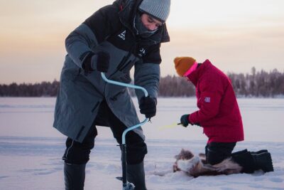 Levi Ice Fishing Experience in the Wild with Campfire Treats