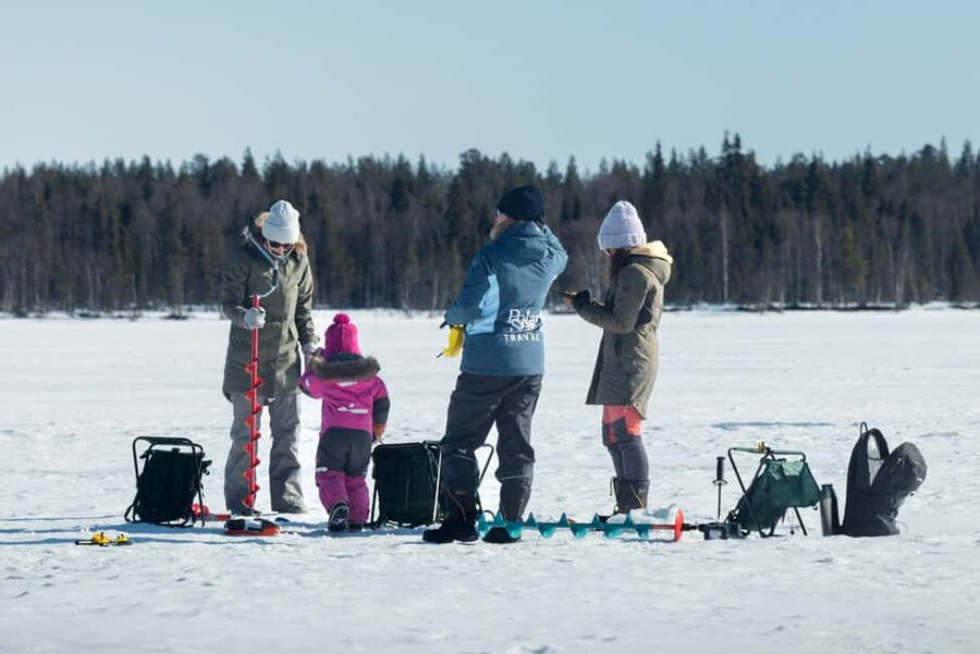 Levi Lapland: Arctic Ice-Fishing - Warm up beside the campfire