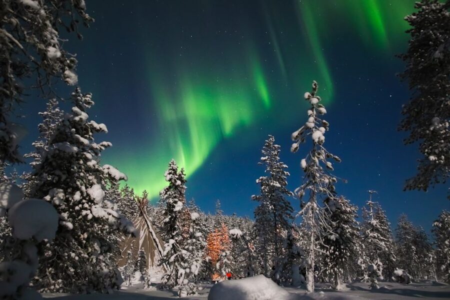 Levi: Northern Lights Campfire - Settling beside the campfire