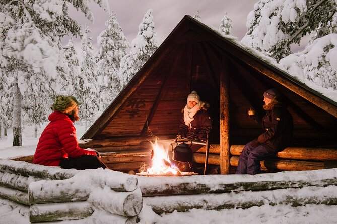 Northern Lights Hunt Including Snacks on Campfire from Rovaniemi - Waiting by a Finnish tent and open fire