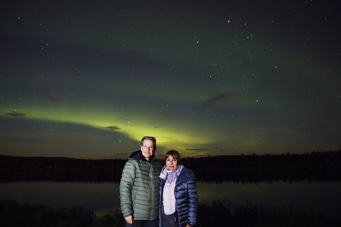 Northern lights hunting photo tour with bbq; small groups - Campfire sausages are part of the experience