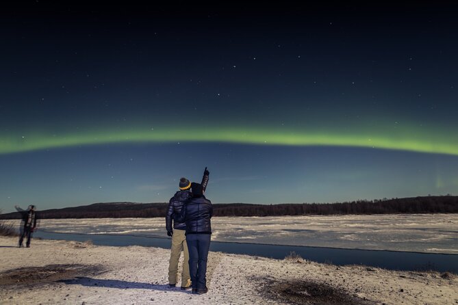 Northern lights hunting photo tour with bbq; small groups - The first stop: dark skies, frozen water, and mixed expectations