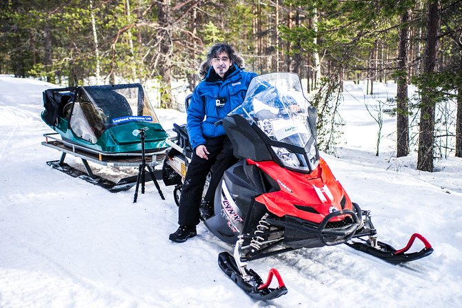 Northern Lights Snowmobile Sleigh Ride - Waiting beside the fire in a tepee