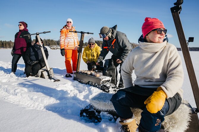 Private Driving Snow Scooters Experience in Finland - The frozen Lake Saimaa section