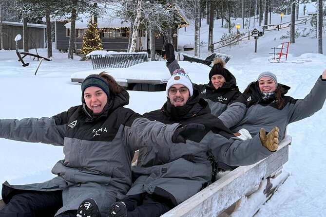 Reindeer Husbandry with Snowmobile Sleigh Ride and Cabin Lunch - The snowmobile sleigh ride over lake and forest