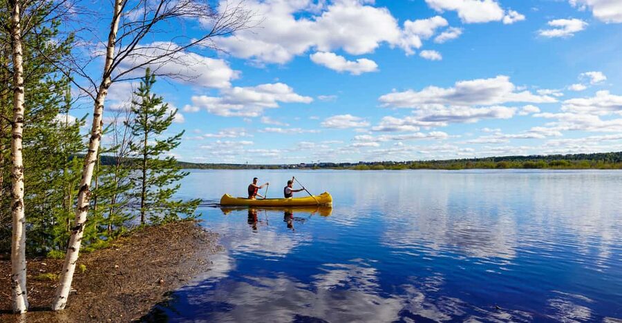 Rovaniemi: All-Day Canoe Adventure - From still lake to rocky inlet