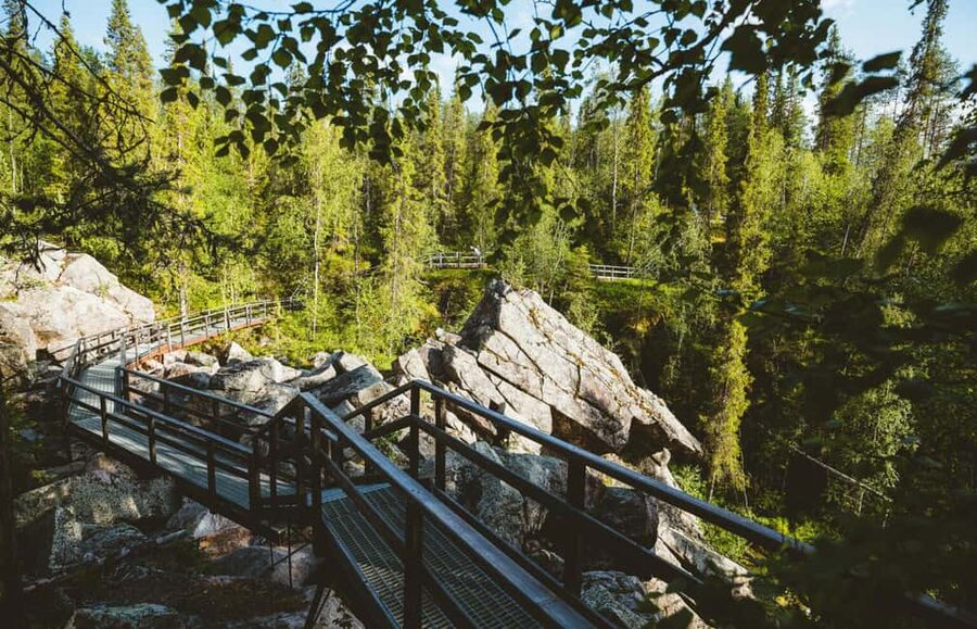 Rovaniemi: Auttiköngäs Waterfalls Hike Tour & Barbeque - The fireside barbecue after the hike