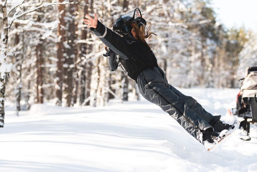Rovaniemi: Family Snowmobile Safari with Campfire and Snacks - The adult snowmobile ride through the woods