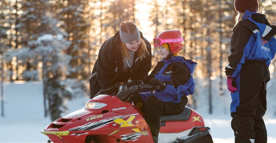 Rovaniemi: Family Snowmobile Trip with Guide and Picnic - The adult snowmobile ride through Lapland