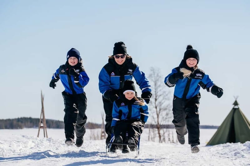 Rovaniemi: Full-Day Snow and Fun Activities - Getting dressed for four hours in the cold