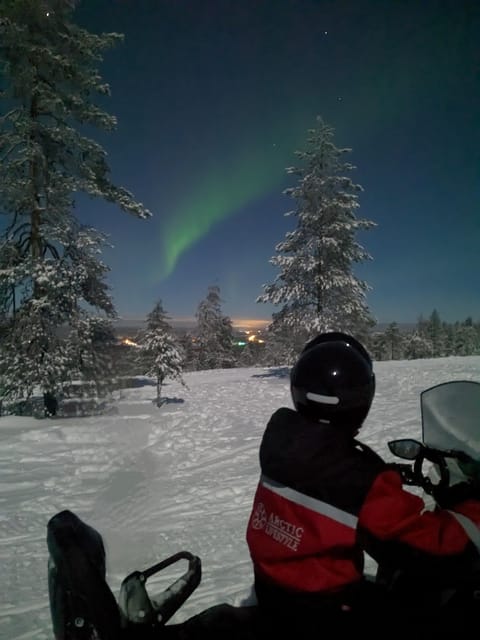 Rovaniemi: Northern Lights Snowmobile Safari with Campfire - Sharing a snowmobile on the forest route