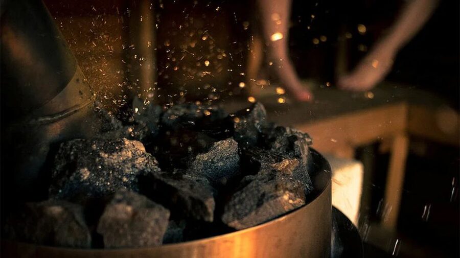 Rovaniemi: Northern Lights Trip with Arctic Sauna & Jacuzzi - The frozen lake swim