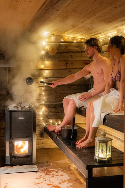 Rovaniemi: Private Sauna and Ice Swimming Tour with Snacks - Heating up in the wooden sauna