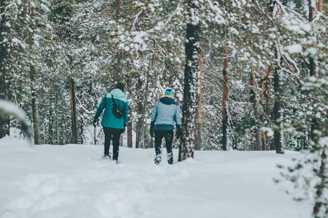 Rovaniemi: Snowshoeing in a magical snowy forest - The fire, sausages, and hot juice