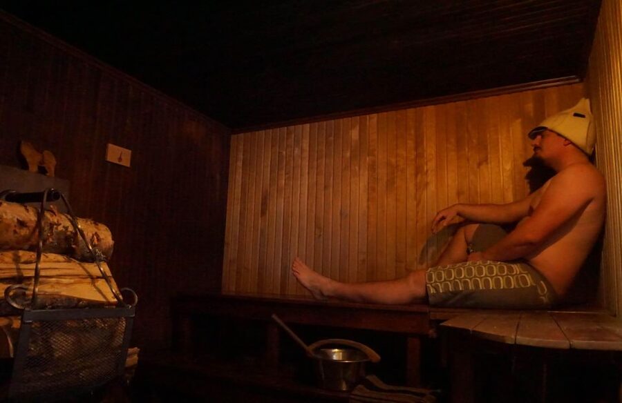 Rovaniemi: Traditional Sauna and Ice Swimming Experience - Northern lights, frozen water, and daytime views