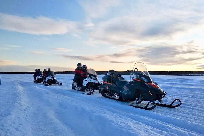 Snowmobile and Ice Fishing Experience - Salmon, sausages, and a fire in the cold