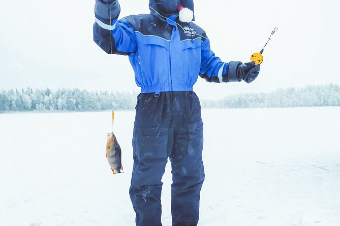 Snowmobiling and ice fishing in Apukka Resort, Rovaniemi - Ice fishing on a frozen pond