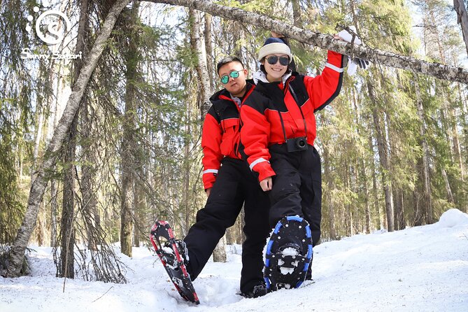 Snowshoeing in Lapland Wilderness - Changing into thermal gear