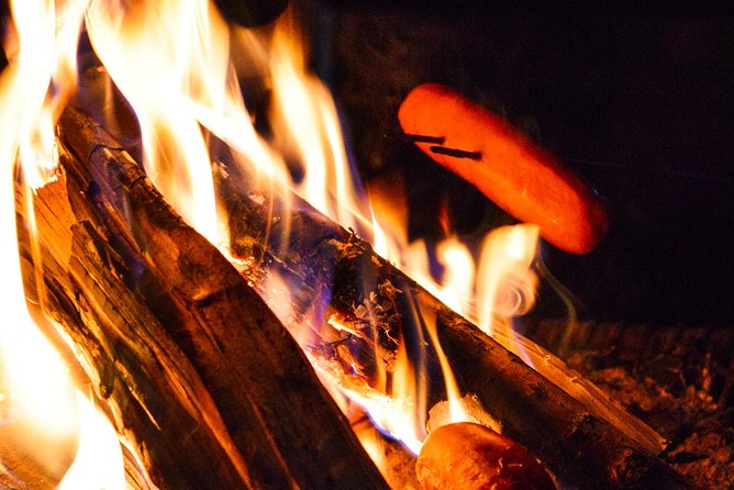 Sunset at the Arctic Circle - Open-fire food in a Lappish tepee