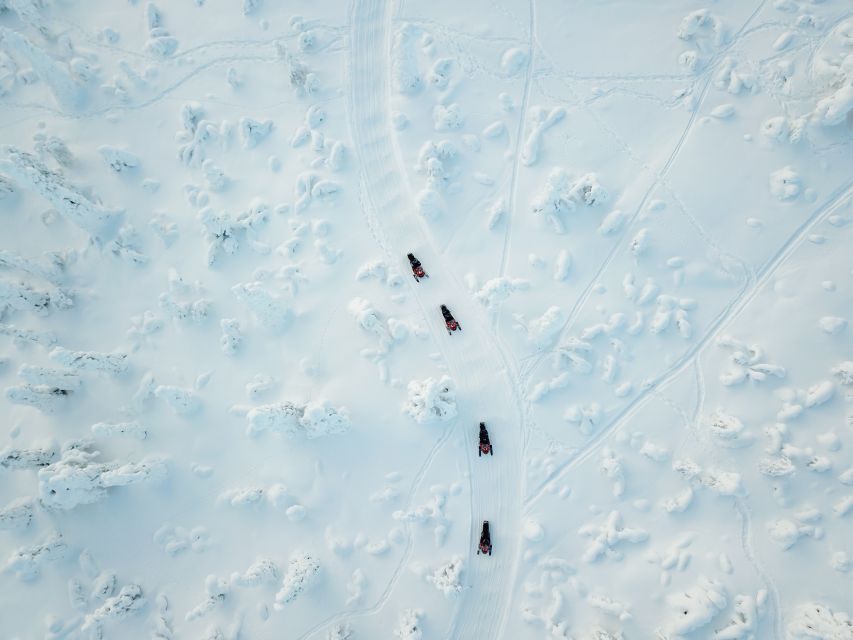 Ylläs: Snowmobile Adventure with Ice Fishing - Sharing the snowmobile and handling odd groups