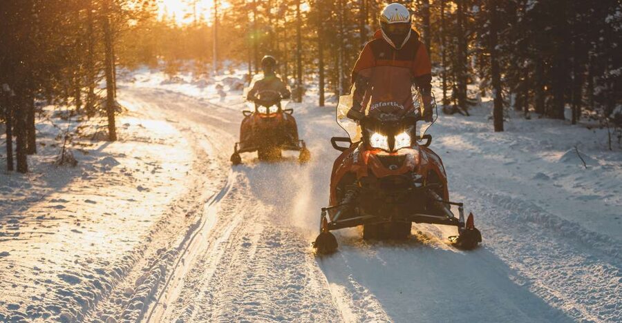Ylläs: Snowmobile Tour to Arctic Snow Village & Snack - Entering the Arctic Snow Village